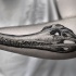Großes im Punktierung Stil schwarzes Unterarm Tattoo mit Krokodilschädel