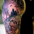 Big terrifying colored mystical church tattoo on shoulder with cemetery and bats