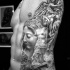 Tatuaje en el costado, 
estatuas antiguas de piedra bien dibujados