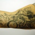Tatuaje en el antebrazo,
corredor con moto