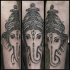 Tatuaggio sul braccio la testa del dio Ganesha