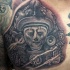 Black and gray style chest tattoo of ancient stone statue