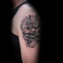 Black and gray style colored shoulder tattoo of Egypt God