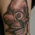 Black and gray style creepy looking tattoo of demonic clown skull