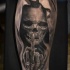 Black and gray style detailed arm tattoo of Grimm reaper