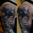 Black and gray style detailed shoulder tattoo of woman face with smoke and rose