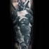 Black and gray style detailed tattoo of reading Deadpool