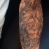 Schwarzer und grauer Stil Unterarm Tattoo mit Löwenkopf