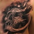 Black and gray style incredible looking chest tattoo of ancient skull