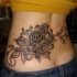 Black and gray style large waist tattoo of big chrysanthemum flower