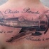 Black and gray style realistic looking upper back tattoo of amazing plane with lettering