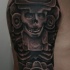 Black and gray style shoulder tattoo of ancient statue