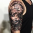 Black and gray style shoulder tattoo of woman with mechanical clock