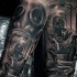 Black and gray style spectacular looking forearm tattoo of soldier in gas mask