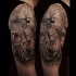 Black and gray style very detailed shoulder tattoo of incredible spider with skull