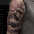 Black and gray style very detailed shoulder tattoo of breathtaking sailing ship