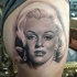 Tatuaje de  Marilyn Monroe hermosa excelente muy realista
