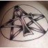 Tatuaje del símbolo negro del Ankh.