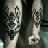 dotwork nero cervo con diamante avambraccio tatuaggio