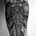 Tatuaje en el antebrazo, elefante de figuras geométricas