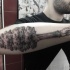 Black ink engraving style arm tattoo of big tree combined with arm