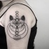 Black ink engraving style shoulder tattoo of cat head with planet parade