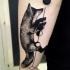 Tatuaggio grande sul braccio la volpe & le palline