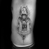Black ink homemade style side tattoo of Anubis God
