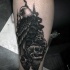 Black ink leg tattoo of detailed crow with skulls and candles