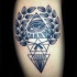 Black ink mystical ornament tattoo with leaves and triangles