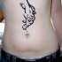 Tatuaggio semplice sulla pancia la pantera in stile tribale