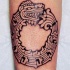 Tatuaje  de quetzalcóatl de piedra