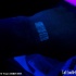 luce nera codice a barre tatuaggio  su polso