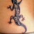 nera lucertola patchwork tatuaggio
