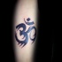 Blackwork style interesting looking arm tattoo of Asian symbol
