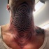 Blackwork style interesting looking neck tattoo of hypnotic ornaments