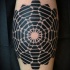 Blackwork style typical leg tattoo of flower