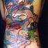 Tatuaje en la espalda, dragón japonés y geisha