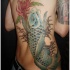 Blue koi fish tattoo for men on ribs