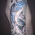 Blue koi fish tattoo on half sleeve