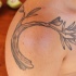 ramo di albero olive tatuaggio sulla spalla