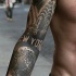 Breathtaking New York themed black ink sleeve tattoo