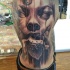 Breathtaking very detailed side tattoo of demonic woman face