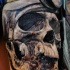 Breathtaking very detailed tattoo of human skull with helmet