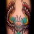 Bright colored Egyptian scarab detailed tattoo in old school style