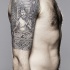 Buddhist tattoo style on arm