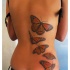 Tatuaggio grande sulla schiena le farfalle