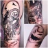 Carelessly painted black ink shoulder tattoo of monster couple with old castle and bats
