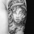 Tatuaje de  Medusa Gorgona volumétrica  en el brazo