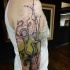 Cartoon style colored shoulder tattoo of big octopus
